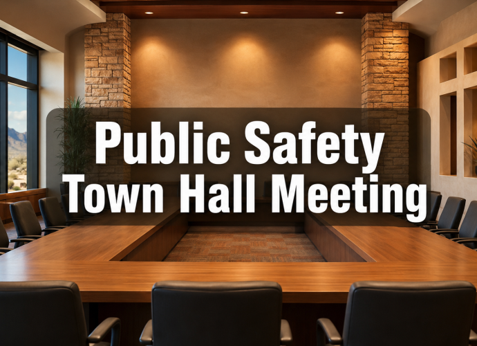 Empty civic meeting room with the words “Public Safety Town Hall Meeting.”