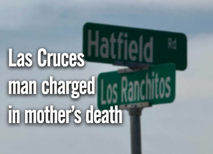 Blurred Hatfield Road and Los Ranchitos Road street signs with the headline "Las Cruces Man Charged in Mother's Death.