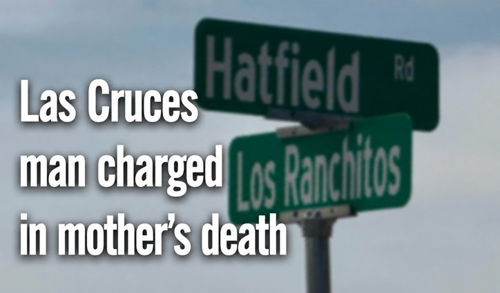 Blurred Hatfield Road and Los Ranchitos Road street signs with the headline "Las Cruces Man Charged in Mother's Death.