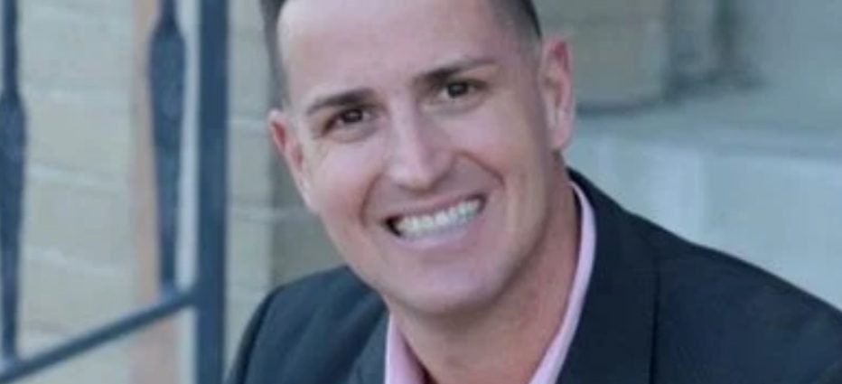 Scott Andrews, former Doña Ana County Manager, smiling in a portrait photo.
