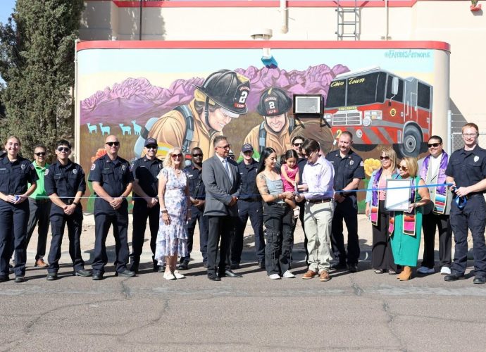 Ribbon-cutting ceremony for the Cultivating Community mural at Las Cruces Fire Station 2.