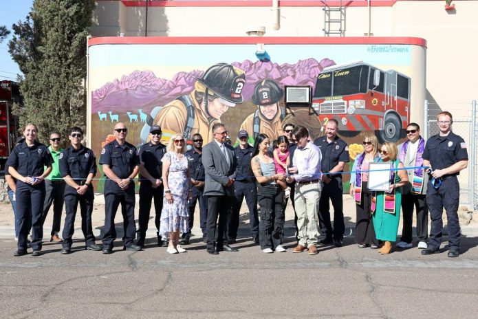 Ribbon-cutting ceremony for the Cultivating Community mural at Las Cruces Fire Station 2.
