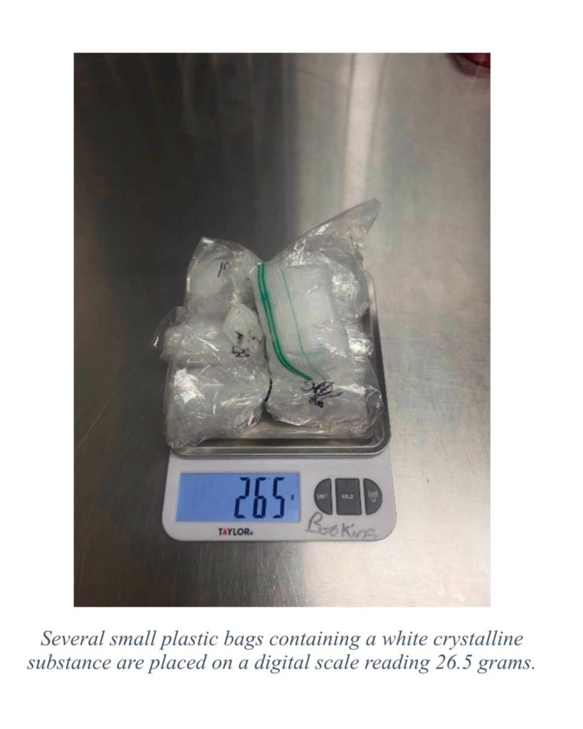 Several small plastic bags containing a white crystalline substance are placed on a digital scale reading 26.5 grams. Photo courtesy of the Las Cruces Police Department.