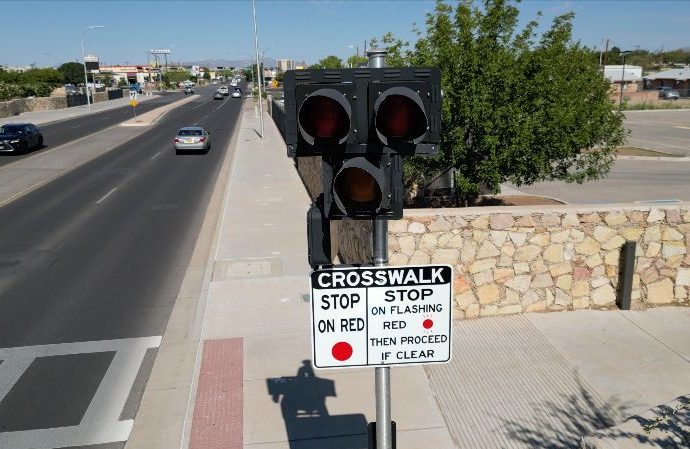 HAWK pedestrian crossing signal along a multi-lane roadway in Las Cruces