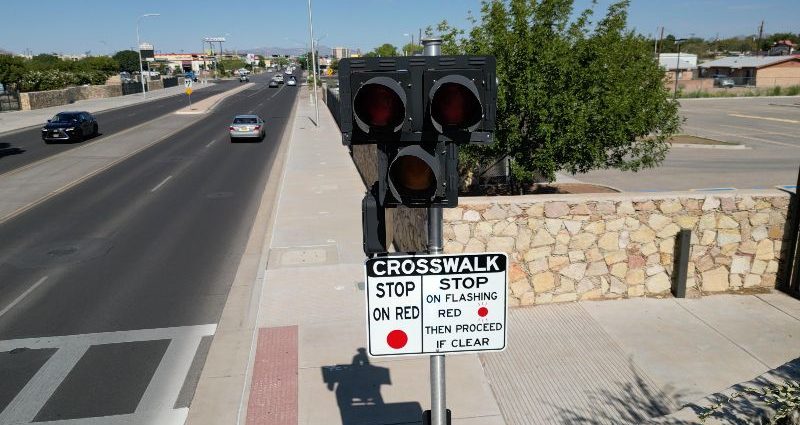 HAWK pedestrian crossing signal along a multi-lane roadway in Las Cruces