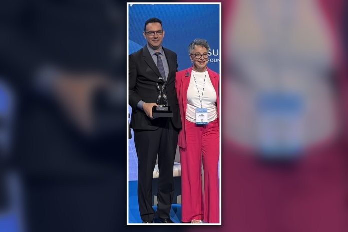 DACC Dental Hygiene Professor Dr. Elmer González receives the international World Dental Hygienist Award.