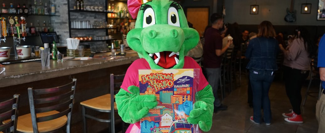 Sally the Alligator holds birthday treats during Downtown Employee Appreciation Day in El Paso.