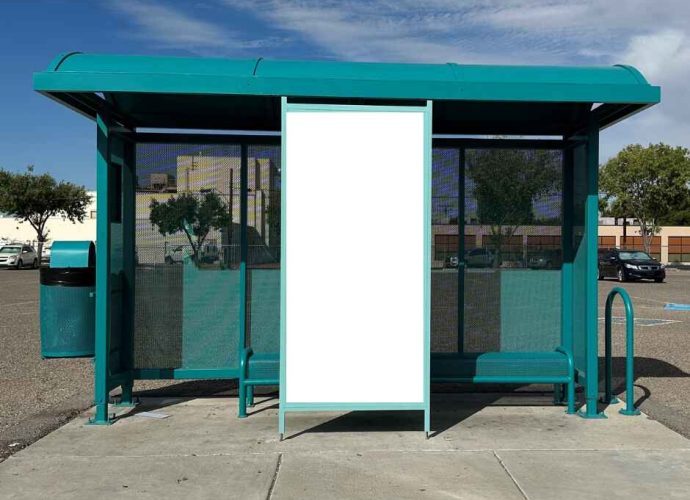 Las Cruces bus shelter with a central display panel for public artwork.