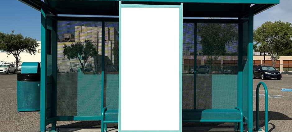 Las Cruces bus shelter with a central display panel for public artwork.